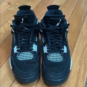 Air Jordan Retro 4 Black and White Sneakers with Suede Leather